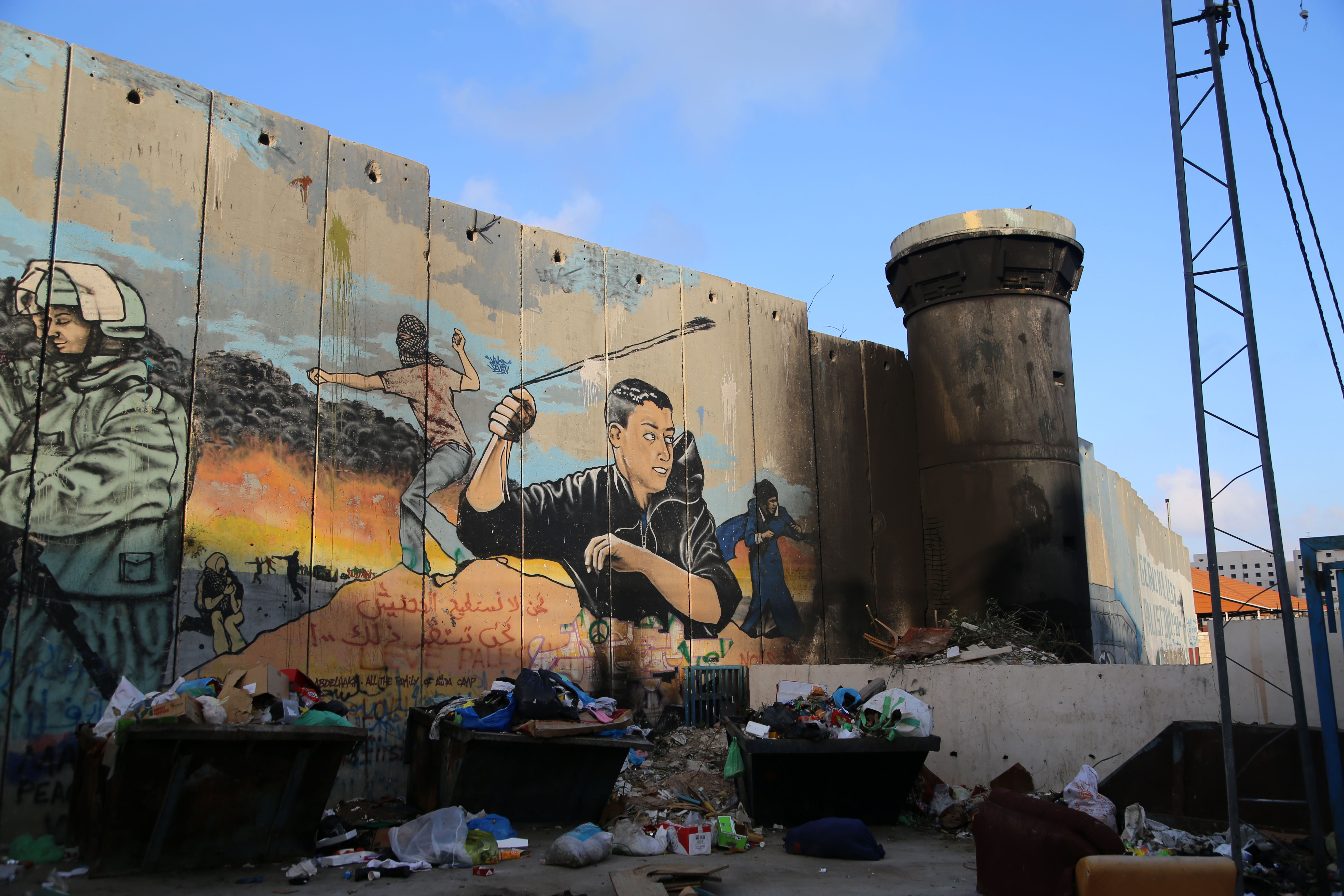 Murals line the wall just outside of Aida refugee camp. Youth from the area set the Israeli Defense Forces watchtower on fire in March 2014 after clashes between Palestinians and Israeli forces left more than a dozen Palestinians shot.