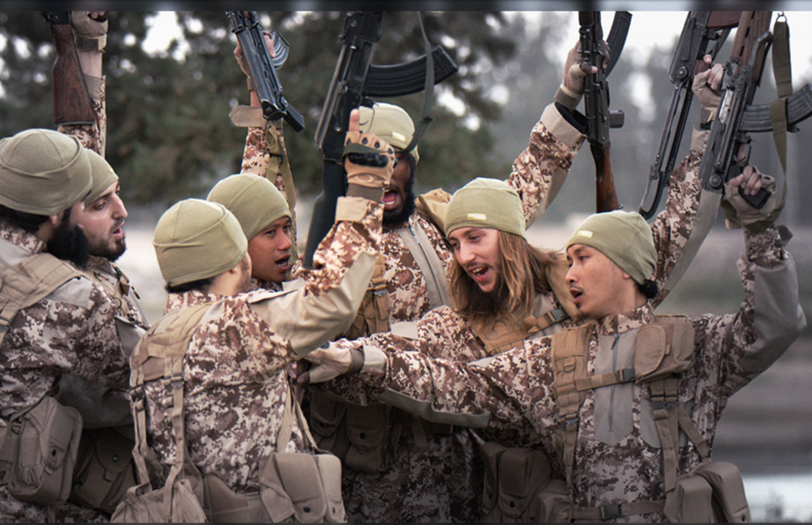 The Islamic State has been quick to trumpet the diversity of recruits its siren call has attracted. This picture is from issue 12 of their English-language magazine 'Dabiq'. 
